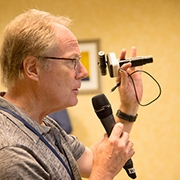 Jim_Wetzel_showing_a_digital_microscope_attachment.jpg