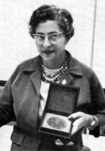 Maria with cinematography award, Düsseldorf, Germany, 1960. (Note: she is wearing a BPA lapel pin.)