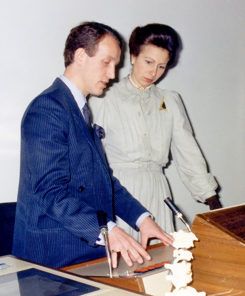 Demonstrating the world’s first, fibre-optic based, two-way television communication system to Princess Anne (Chancellor of the University of London). The system connected eight teaching hospitals across London.